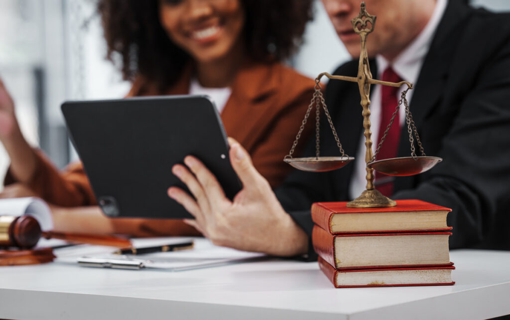 Man and woman discussing at a law office